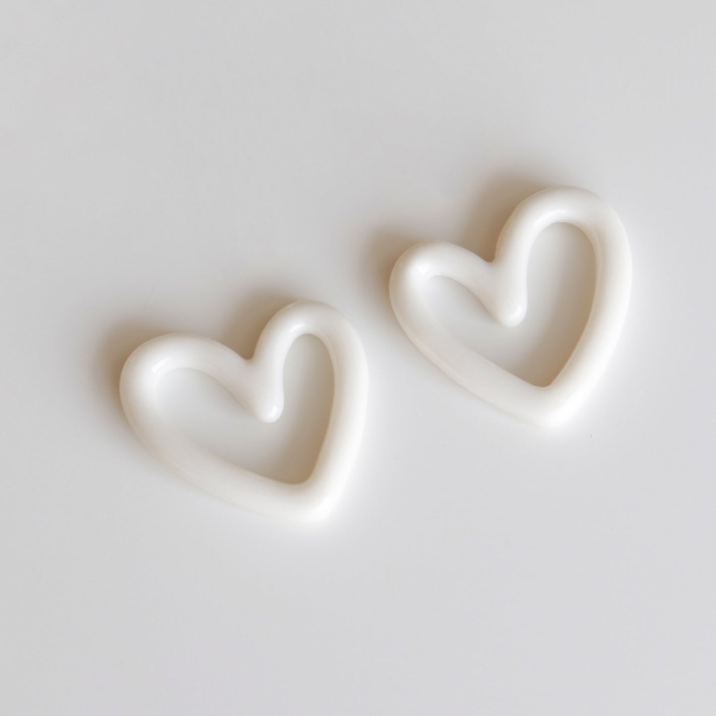 The Heart Earrings by Rozenthal Jewelry are lightweight, waterproof, and perfect for adding everyday elegance.