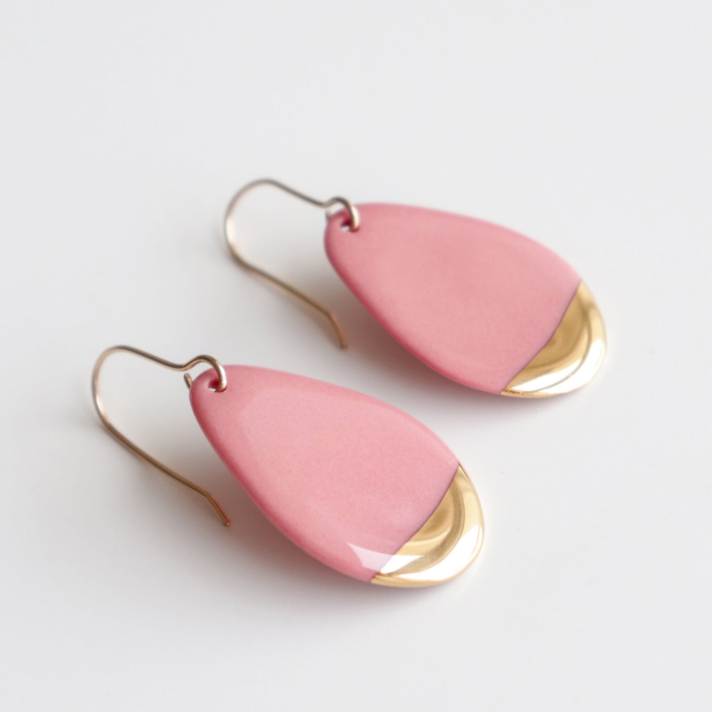 Drop Earrings / S by Rozenthal Jewelry are teardrop-shaped earrings featuring pink enamel and gold accents near the bottom, shown on a white background.